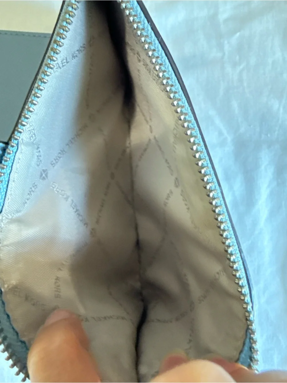Michael Kors Light Blue Wristlet Clutch with Gold Logo